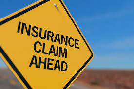 Insurance cliam ahead sign